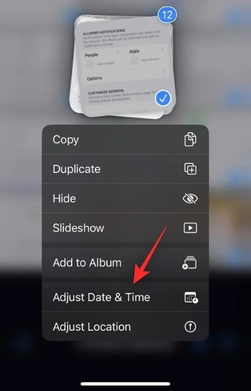 Sådan redigeres metadata for flere billeder på iPhone på iOS 16