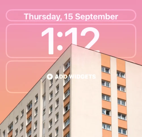 Sådan sætter du tid bag tapet i iOS 16