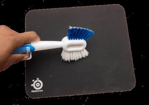 Kā notīrīt peles paliktni