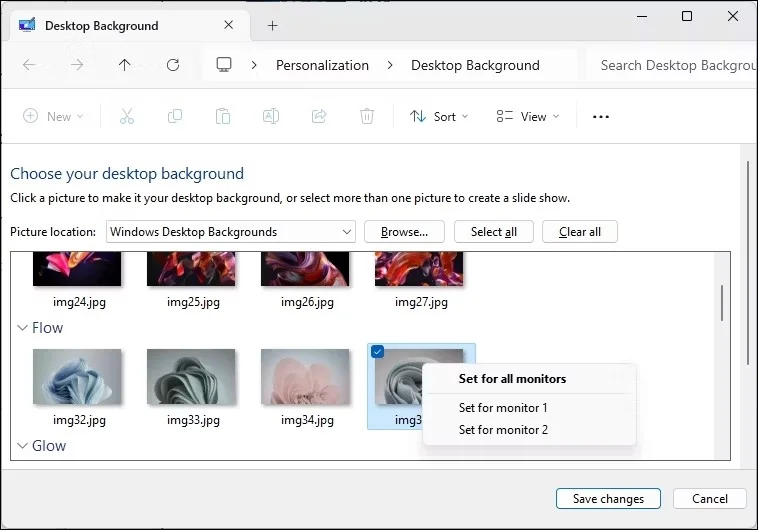 Sådan indstiller du forskellige baggrunde på hver skærm i Windows 10/11